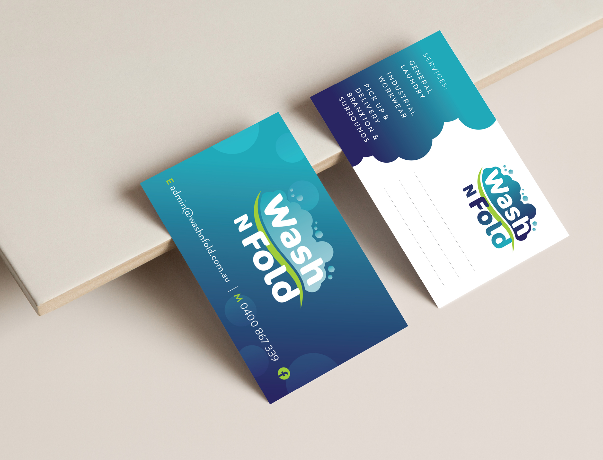 wash n fold business card design by prism design studio